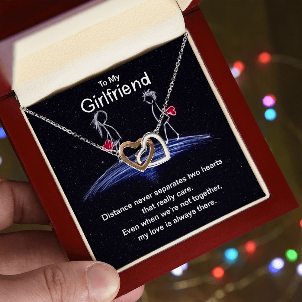 Give your girlfriend the gift that symbolizes your never-ending love. Featuring two lovely hearts embellished with cubic zirconia crystals, this Interlocking Hearts necklace is the perfect accessory for everyday wear. Whether it's a memorable anniversary or a special birthday, make sure to dazzle your special someone by gifting them this stunning necklace.