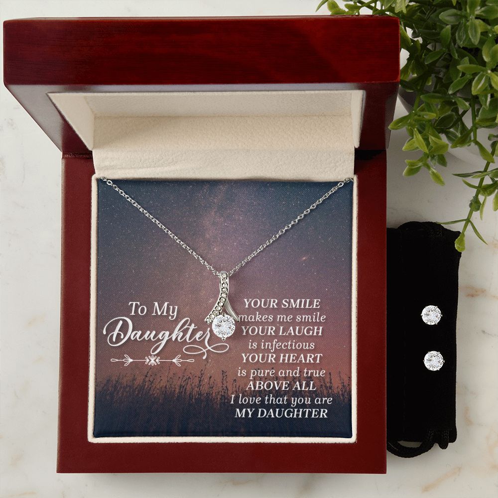 Imagine her reaction when your loved one opens this stunning gift! The Alluring Beauty Necklace and Cubic Zirconia Earring Set is a sweet treat that is sure to dazzle your special someone! The necklace and earring pairing provides loads of sparkle when worn together or separately, and is perfect for any occasion! Do not miss out on this special offering!