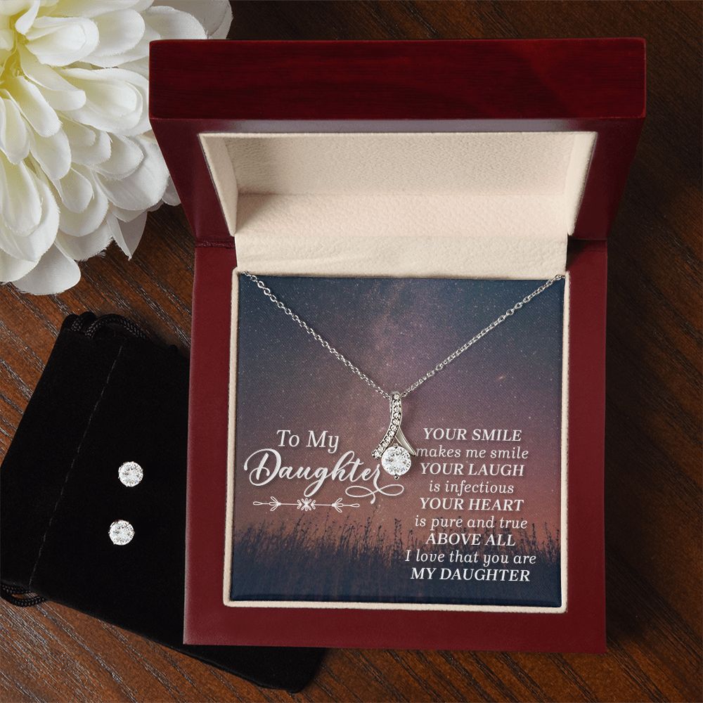 Imagine her reaction when your loved one opens this stunning gift! The Alluring Beauty Necklace and Cubic Zirconia Earring Set is a sweet treat that is sure to dazzle your special someone! The necklace and earring pairing provides loads of sparkle when worn together or separately, and is perfect for any occasion! Do not miss out on this special offering!