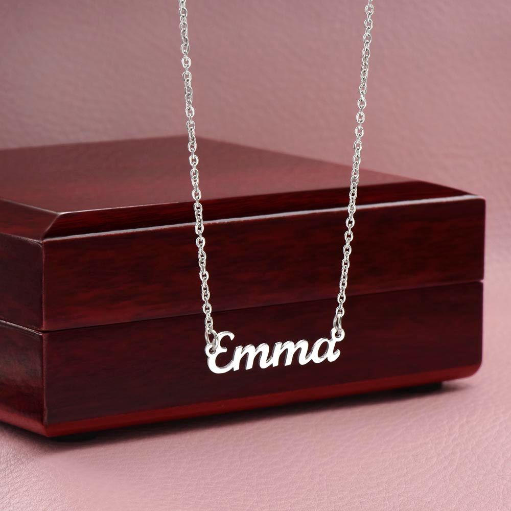 This stylish necklace features a cursive name design suspended on an 16”-18” adjustable cable chain, making it both personal and beautiful! Your necklace will be custom made upon ordering in the name or word of your choice, with up to 10 characters. It's a gift that they will surely want to keep close to their heart forever!