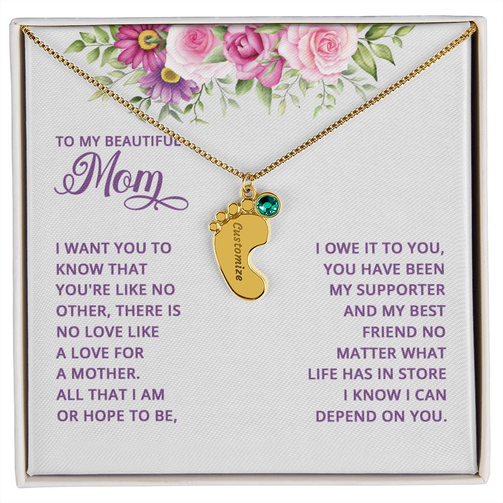 Adorn yourself with a timelessly beautiful piece of jewelry. Crafted with a subtle delicateness, the Baby Feet Necklace with Birthstone is a gorgeous combination of elegance and sentimentality. Symbolizing the unbreakable bond between mother and child, this custom necklace is crafted with personalized details and a birthstone of your choosing.