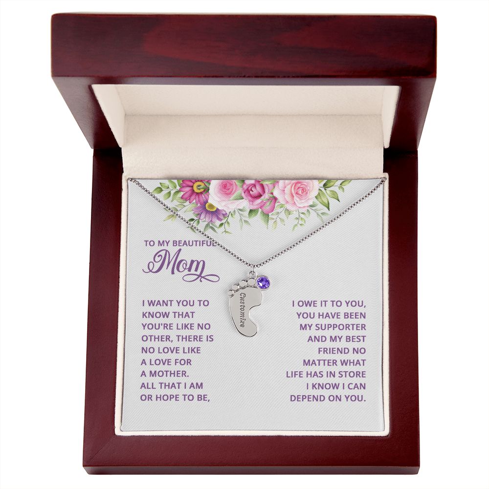 Adorn yourself with a timelessly beautiful piece of jewelry. Crafted with a subtle delicateness, the Baby Feet Necklace with Birthstone is a gorgeous combination of elegance and sentimentality. Symbolizing the unbreakable bond between mother and child, this custom necklace is crafted with personalized details and a birthstone of your choosing.