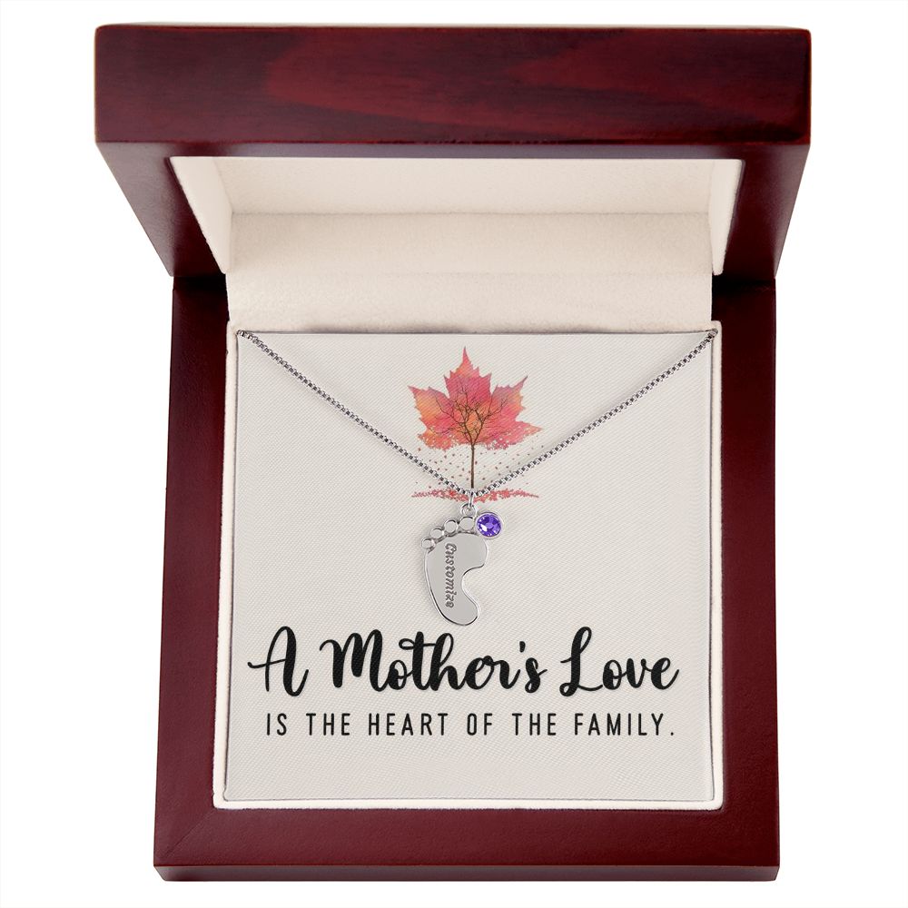 Celebrate the arrival of a newborn or cherish a precious memory with our Custom Baby Feet Necklace with Birthstone. Personalize your gift by engraving a name of your choice onto the pendant and choosing a crystal that correlates with the baby's birth month.