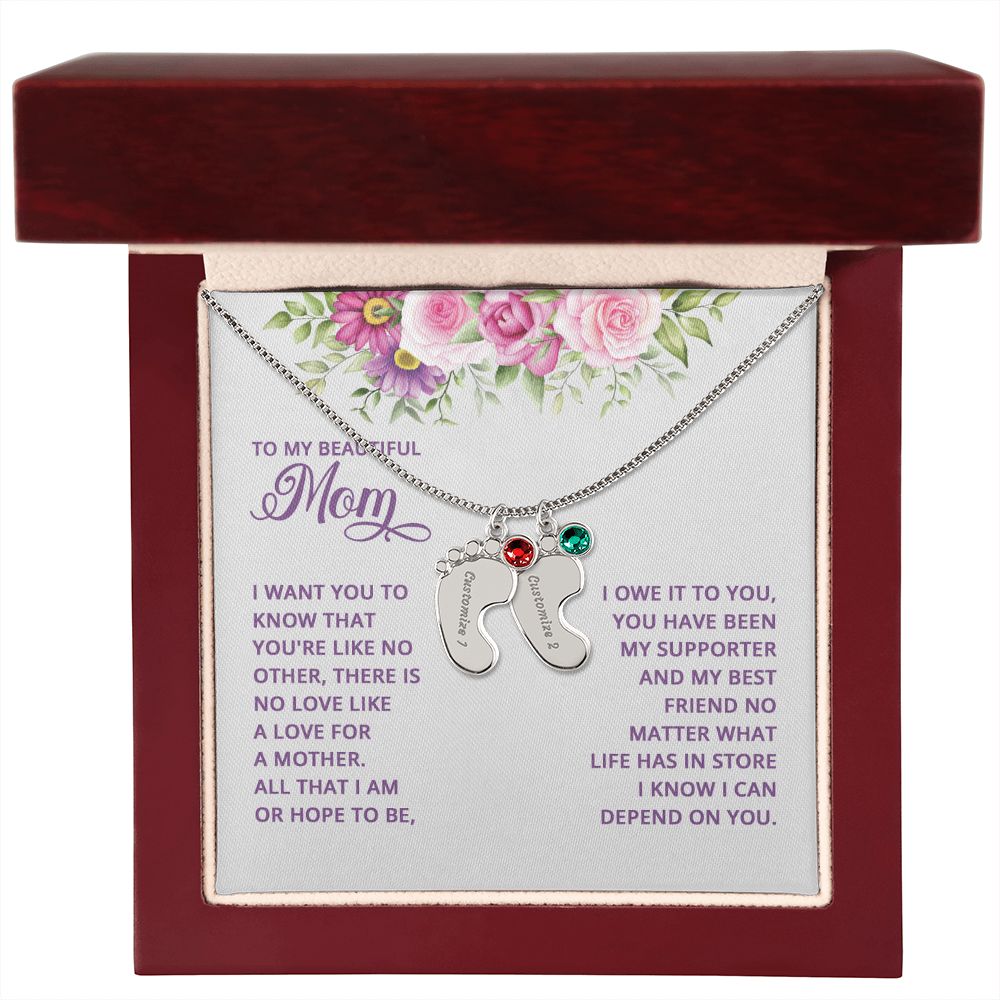 Adorn yourself with a timelessly beautiful piece of jewelry. Crafted with a subtle delicateness, the Baby Feet Necklace with Birthstone is a gorgeous combination of elegance and sentimentality. Symbolizing the unbreakable bond between mother and child, this custom necklace is crafted with personalized details and a birthstone of your choosing.