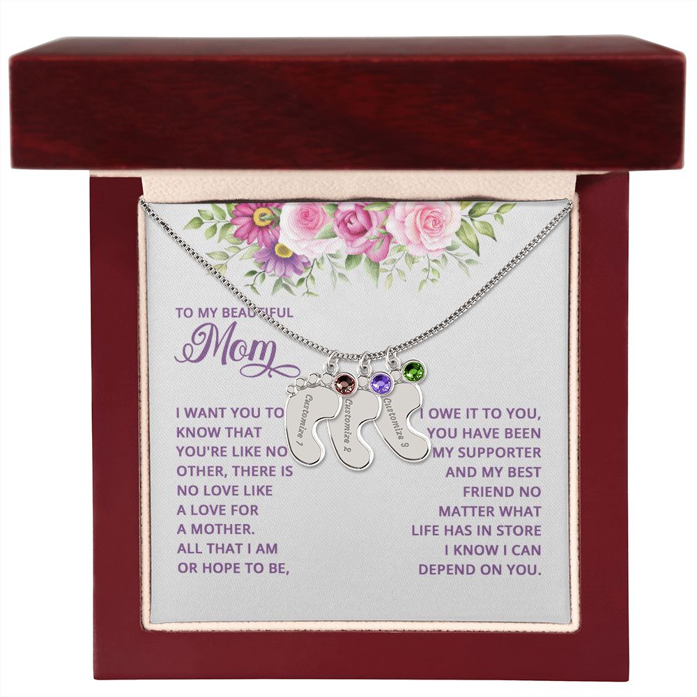 Adorn yourself with a timelessly beautiful piece of jewelry. Crafted with a subtle delicateness, the Baby Feet Necklace with Birthstone is a gorgeous combination of elegance and sentimentality. Symbolizing the unbreakable bond between mother and child, this custom necklace is crafted with personalized details and a birthstone of your choosing.