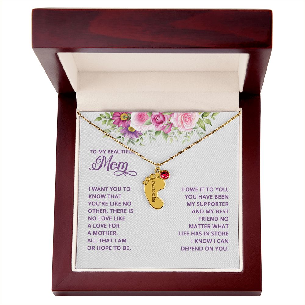 Adorn yourself with a timelessly beautiful piece of jewelry. Crafted with a subtle delicateness, the Baby Feet Necklace with Birthstone is a gorgeous combination of elegance and sentimentality. Symbolizing the unbreakable bond between mother and child, this custom necklace is crafted with personalized details and a birthstone of your choosing.