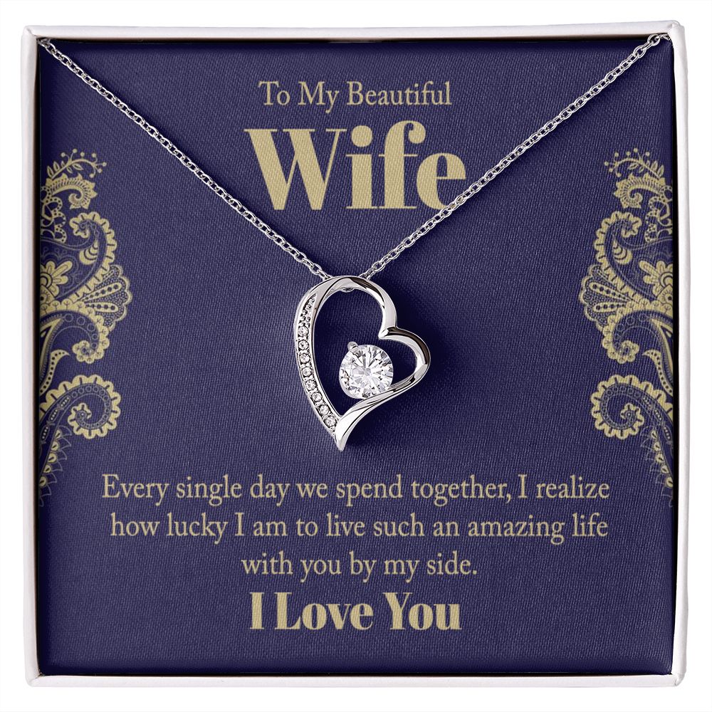 The dazzling Forever Love Necklace is sure to make her heart melt! This necklace features a stunning 6.5mm CZ crystal surrounded by a polished heart pendant embellished with smaller crystals to add extra sparkle and shine. Beautifully crafted with either a white gold or yellow gold finish, be sure to give her a classic gift she can enjoy everyday.