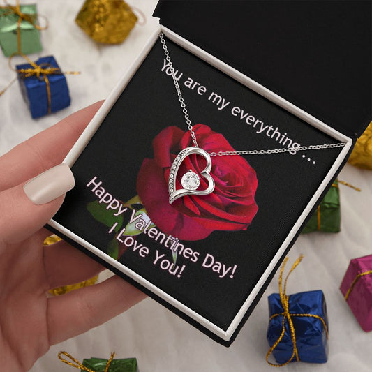 The dazzling Forever Love Necklace is sure to make her heart melt! This necklace features a stunning 6.5mm CZ crystal surrounded by a polished heart pendant embellished with smaller crystals to add extra sparkle and shine. Beautifully crafted with either a white gold or yellow gold finish, be sure to give her a classic gift she can enjoy everyday.