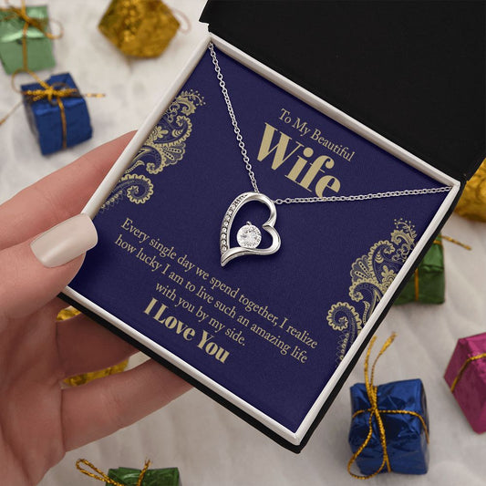 The dazzling Forever Love Necklace is sure to make her heart melt! This necklace features a stunning 6.5mm CZ crystal surrounded by a polished heart pendant embellished with smaller crystals to add extra sparkle and shine. Beautifully crafted with either a white gold or yellow gold finish, be sure to give her a classic gift she can enjoy everyday.