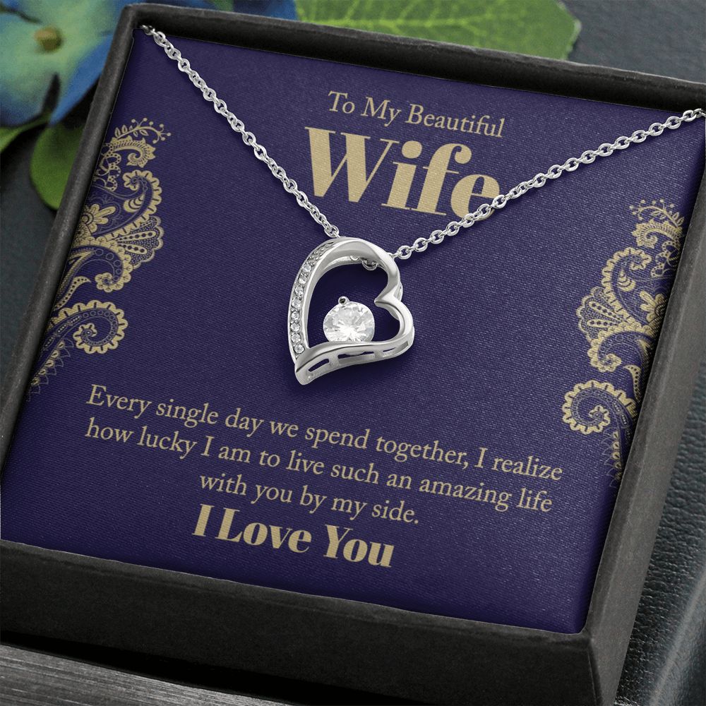 The dazzling Forever Love Necklace is sure to make her heart melt! This necklace features a stunning 6.5mm CZ crystal surrounded by a polished heart pendant embellished with smaller crystals to add extra sparkle and shine. Beautifully crafted with either a white gold or yellow gold finish, be sure to give her a classic gift she can enjoy everyday.