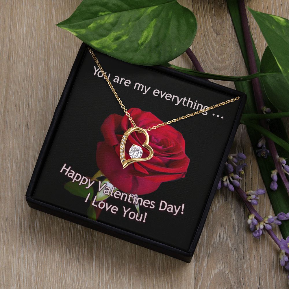 The dazzling Forever Love Necklace is sure to make her heart melt! This necklace features a stunning 6.5mm CZ crystal surrounded by a polished heart pendant embellished with smaller crystals to add extra sparkle and shine. Beautifully crafted with either a white gold or yellow gold finish, be sure to give her a classic gift she can enjoy everyday.