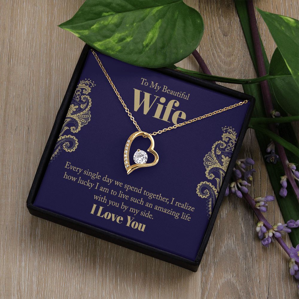 The dazzling Forever Love Necklace is sure to make her heart melt! This necklace features a stunning 6.5mm CZ crystal surrounded by a polished heart pendant embellished with smaller crystals to add extra sparkle and shine. Beautifully crafted with either a white gold or yellow gold finish, be sure to give her a classic gift she can enjoy everyday.
