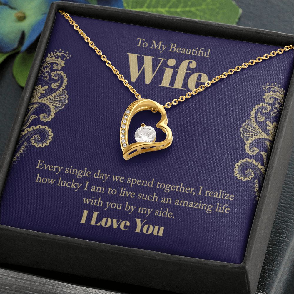 The dazzling Forever Love Necklace is sure to make her heart melt! This necklace features a stunning 6.5mm CZ crystal surrounded by a polished heart pendant embellished with smaller crystals to add extra sparkle and shine. Beautifully crafted with either a white gold or yellow gold finish, be sure to give her a classic gift she can enjoy everyday.