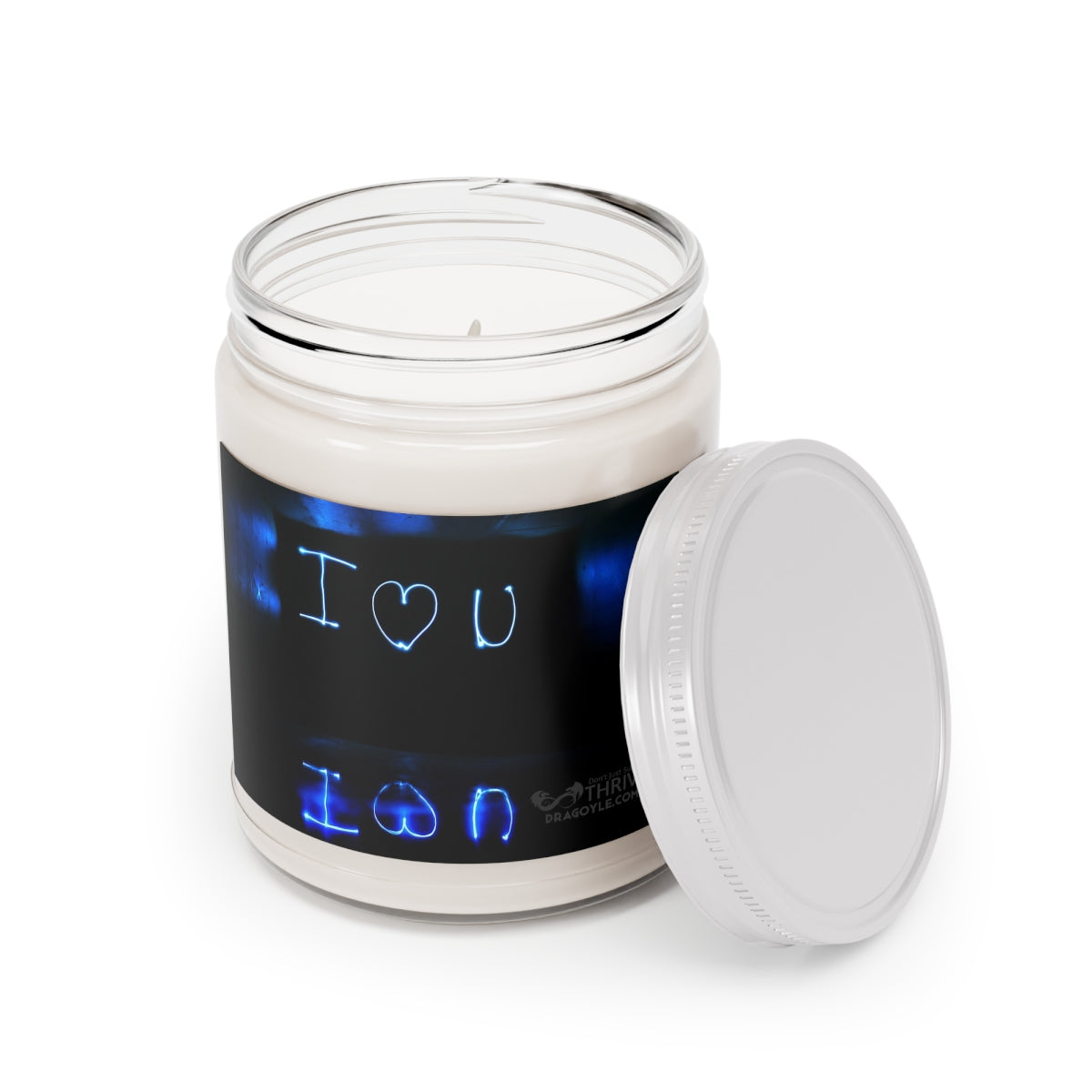 This custom candle jar can accommodate all your ideas, artwork, or inspirational quotes on its custom candle label. The candle itself is made 100% with a natural soy wax blend and cotton wick. Choose between ambrosial fragrances such as Vanilla Bean, Comfort Spice, and Sea Breeze.