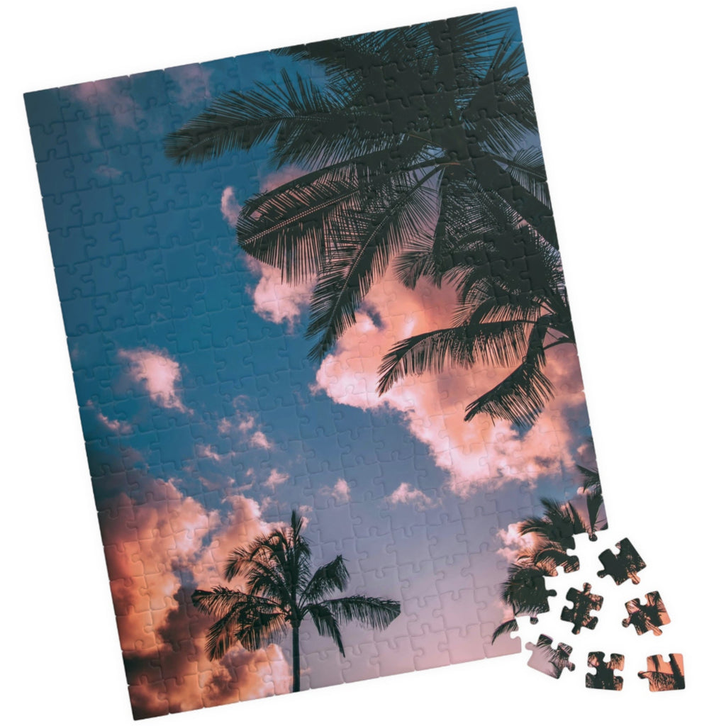 Indulge in the ultimate luxury puzzle experience with our Pink Clouds Palm Trees Puzzle. With 110 to 1014 pieces, this puzzle features a dreamy pink sky and lush palm trees, transporting you to a world of relaxation. Perfect for both puzzle enthusiasts and art lovers, this puzzle is a must-have for your collection.