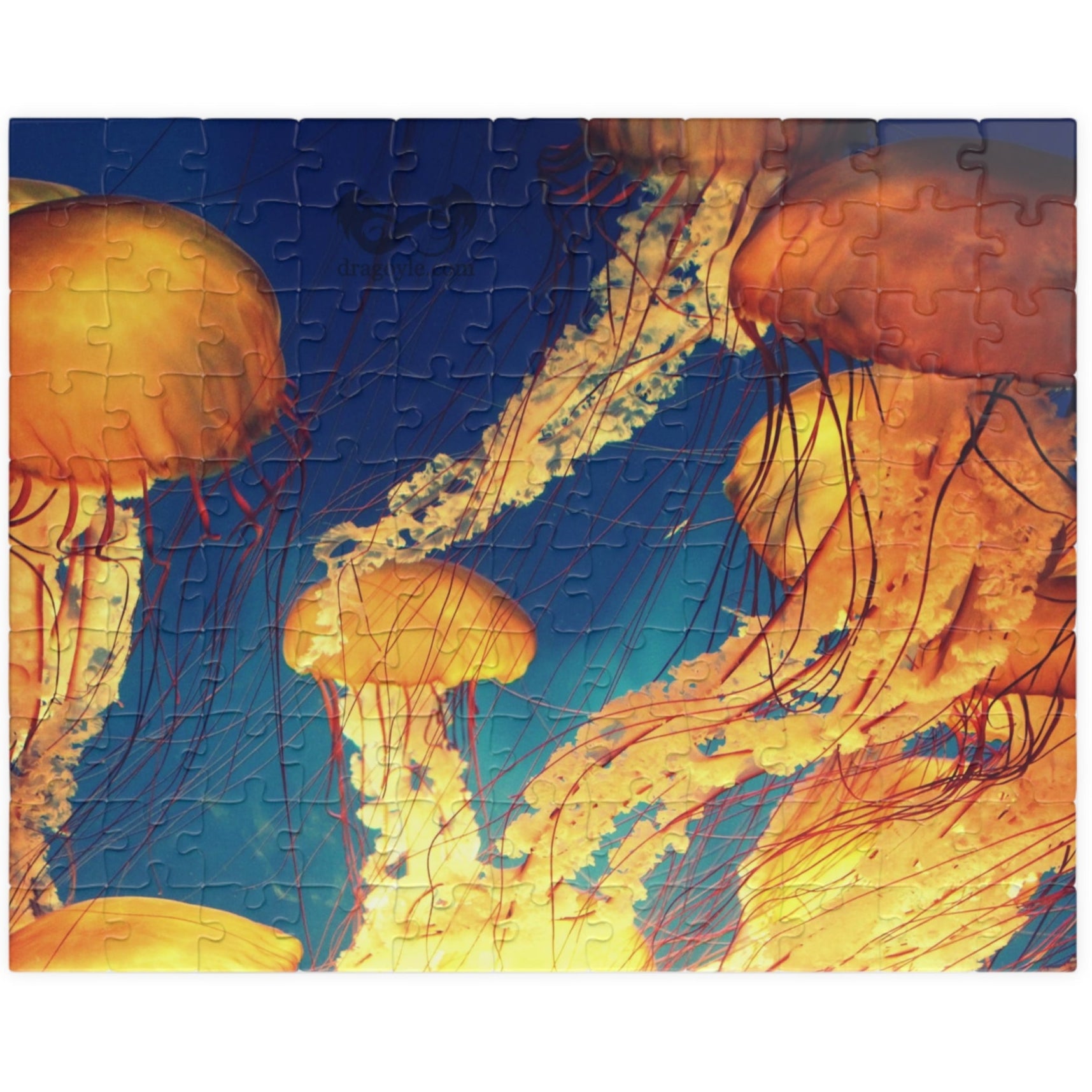 Indulge in the essence of the ocean with our Orange Jellyfish Puzzle. Crafted with 110 to 1014 pieces, this puzzle captures the striking hues and intricate details of a jellyfish. Dive into a world of relaxation and challenge your mind simultaneously.