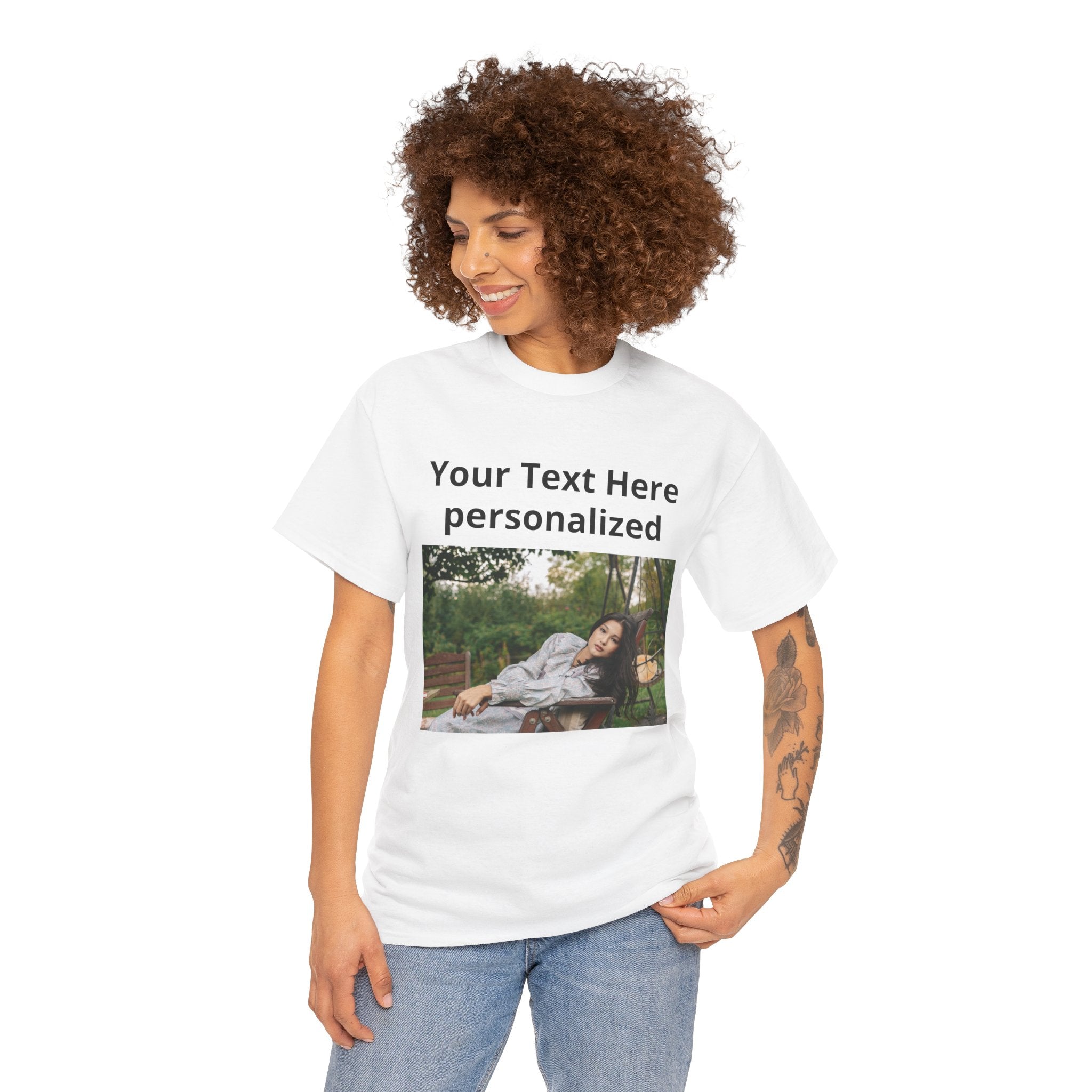 Person wearing a white t-shirt with a photo and text 'Your Text Here personalized' on a white background