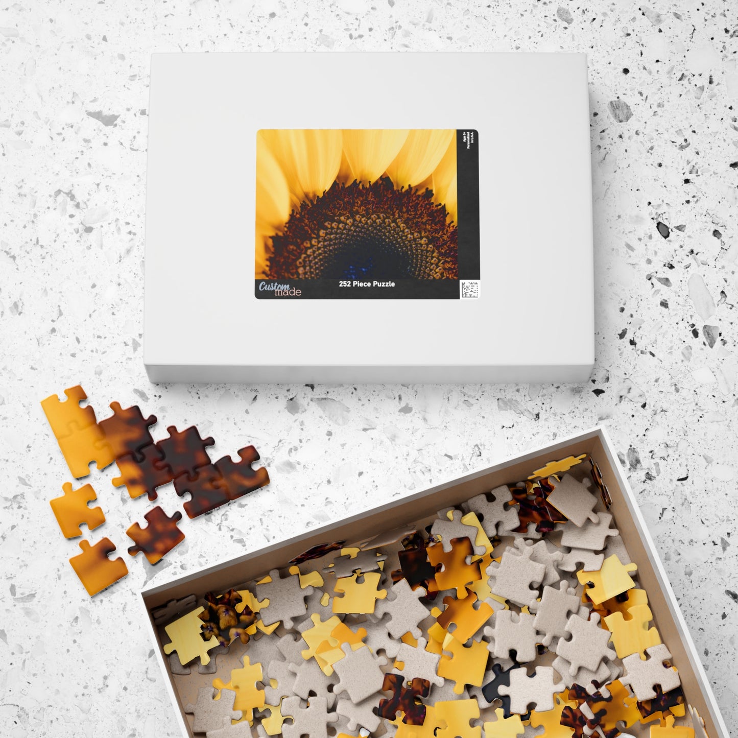 Unleash your inner puzzle solver with our Sunflower Close Up Puzzle! Piece together the vibrant colors and intricate details of this 110 to 1014 piece puzzle. Perfect for anyone who loves a challenge, this puzzle will provide hours of entertainment and a sense of accomplishment upon completion. Get yours today and experience the joy of solving!