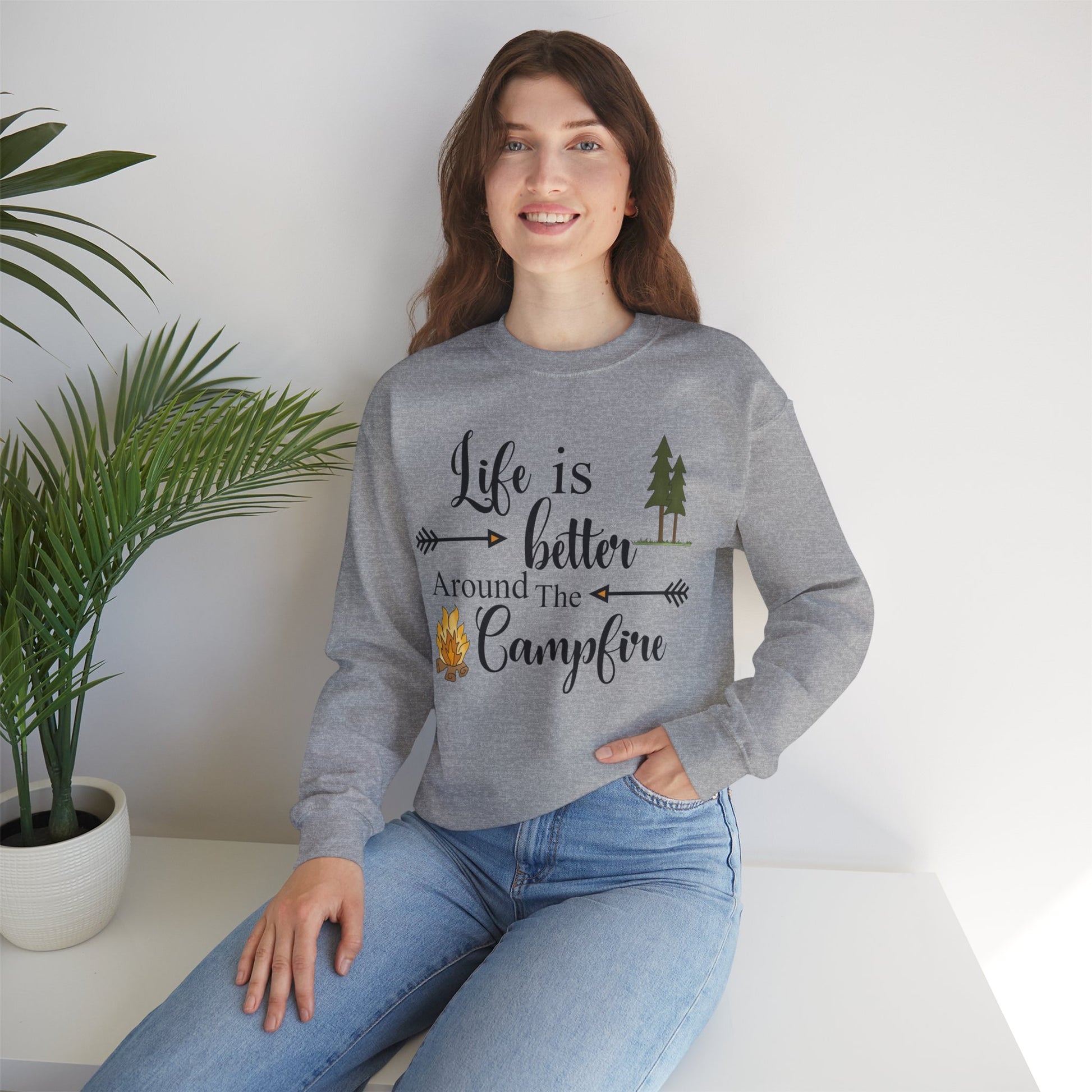 Experience the comforting warmth and camaraderie of a cozy campfire with our Life is Better Around the Campfire sweatshirt. Made with heavy blend fabric, it's perfect for cool evenings spent in the great outdoors. Get yours now and make every camping trip even more memorable!