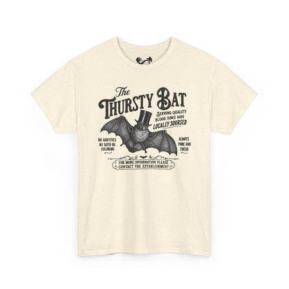 An off-white short-sleeve t-shirt with a vintage-style black graphic of a bat wearing a top hat and the text 'The Thirsty Bat'.