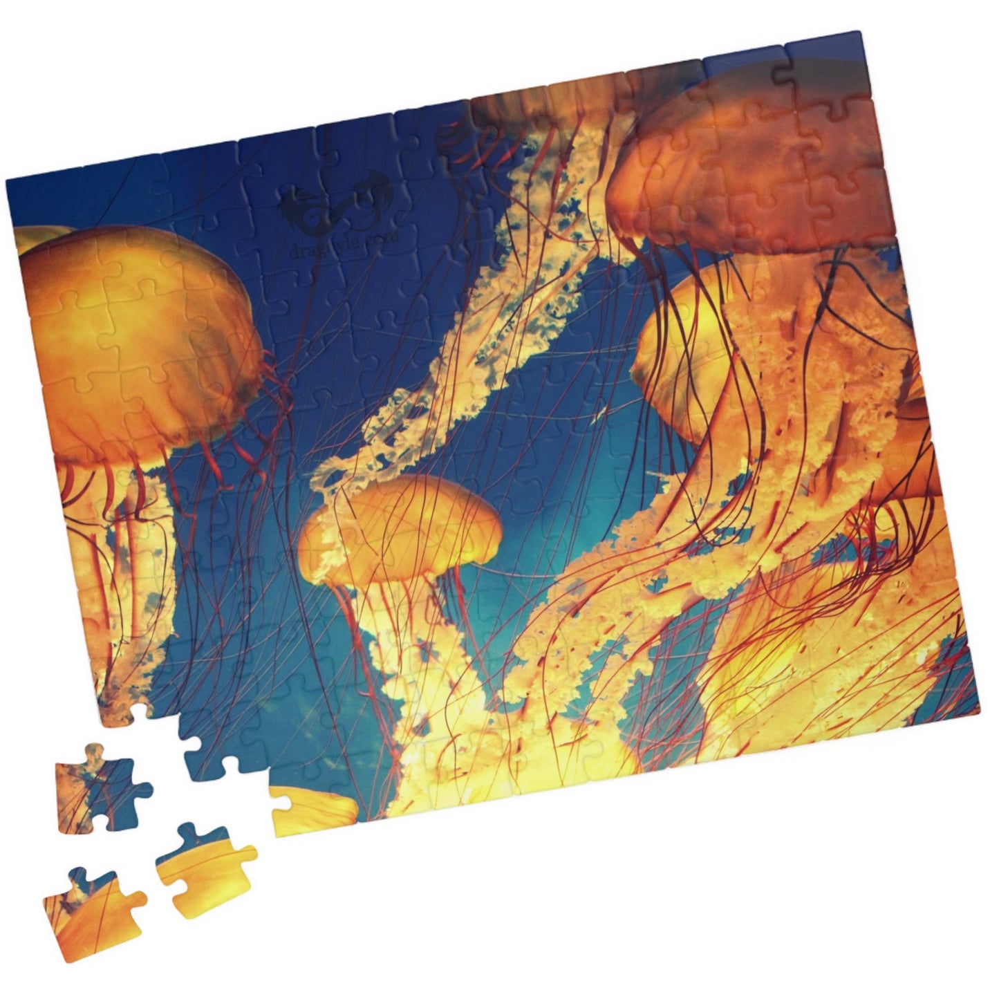 Indulge in the essence of the ocean with our Orange Jellyfish Puzzle. Crafted with 110 to 1014 pieces, this puzzle captures the striking hues and intricate details of a jellyfish. Dive into a world of relaxation and challenge your mind simultaneously.