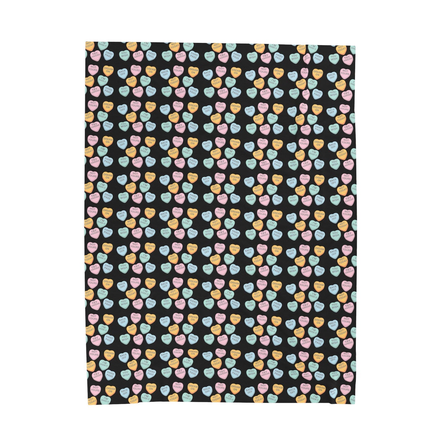 Patterned fabric with colorful hearts on a black background