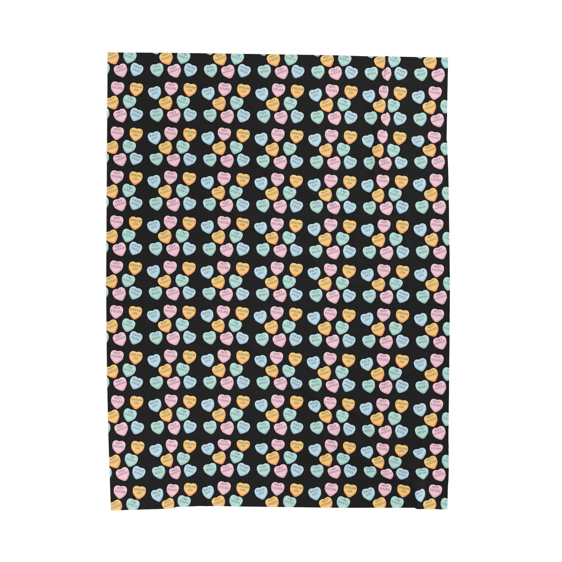 Patterned fabric with colorful hearts on a black background