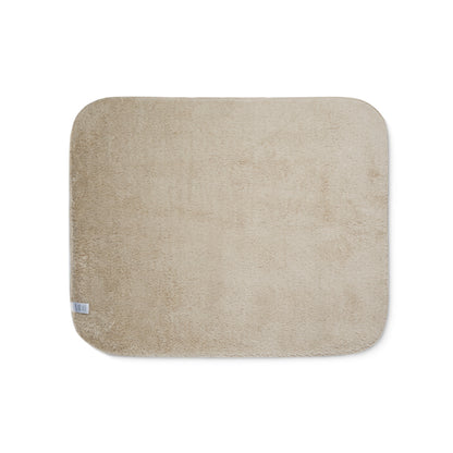 Beige bath mat on a white background
