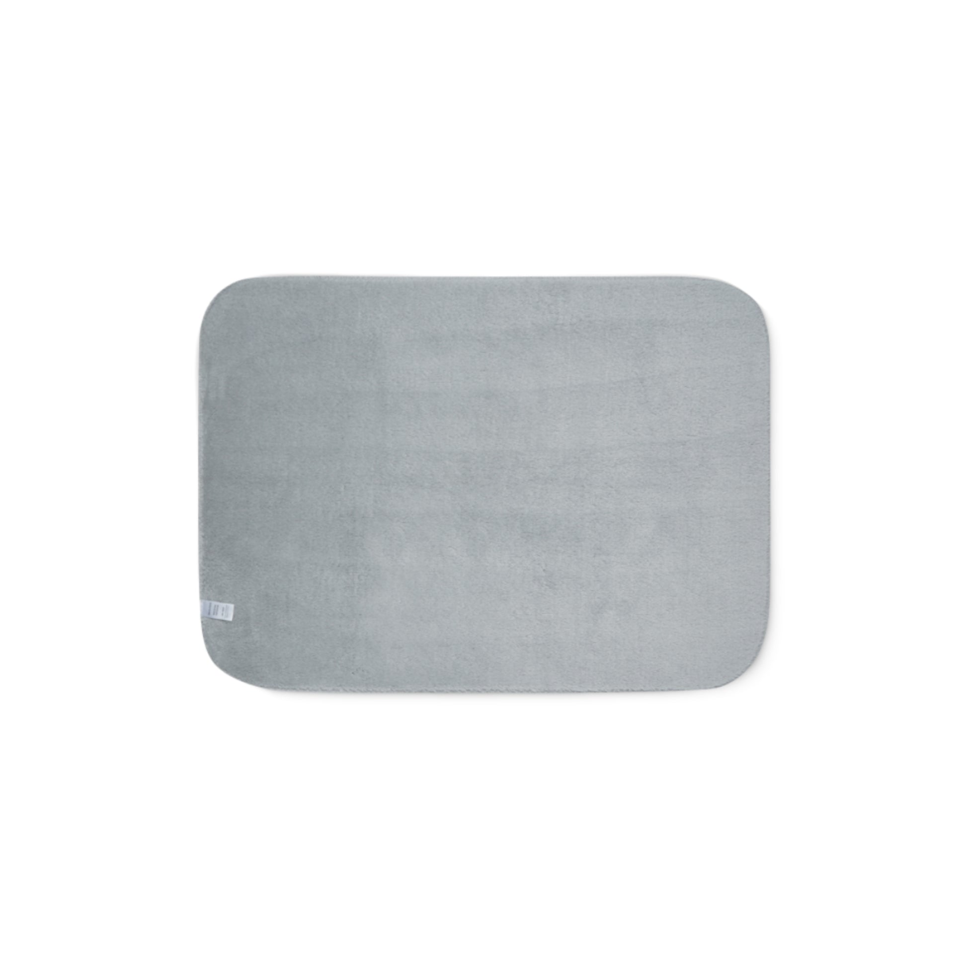 Gray rectangular bath mat on a white background