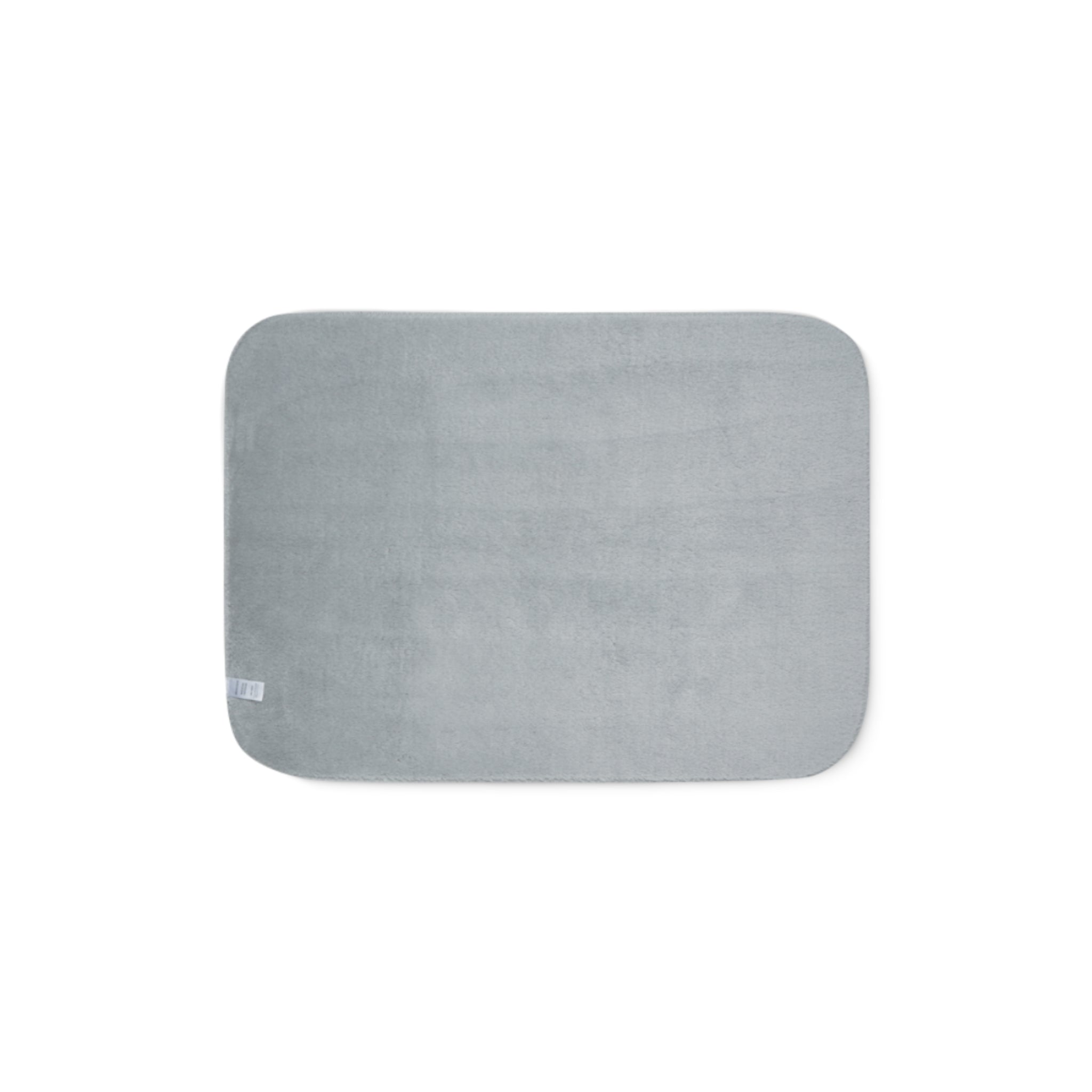 Gray rectangular bath mat on a white background