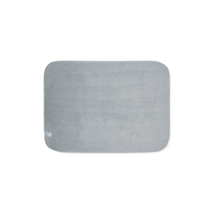 Gray rectangular bath mat on a white background