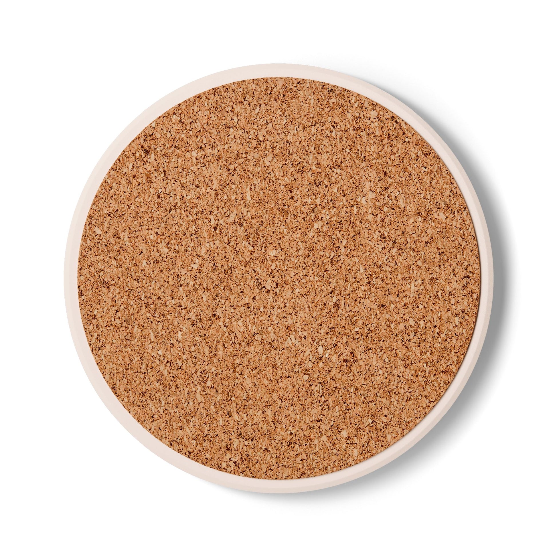 Round cork board on a white background