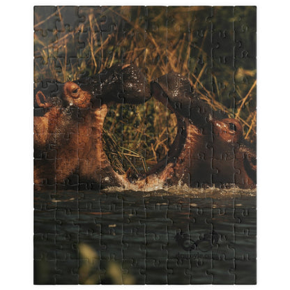 Join the love story of two adorable hippos with this Kissing Hippos Puzzle! With 110 to 1014 pieces, this puzzle offers a challenge for all levels. Piece by piece, watch the vibrant colors and intricate details come together to create a heartwarming scene that will inspire you every time you complete it.