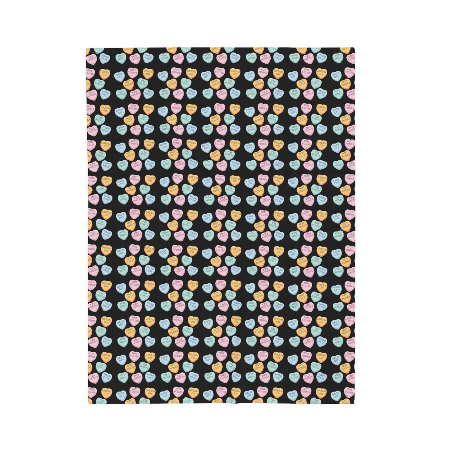 Patterned fabric with colorful hearts on a black background