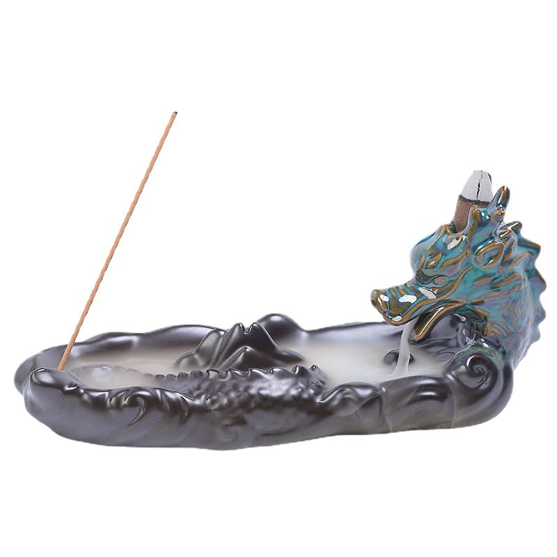 Experience the captivating aroma of burning incense with this stunning Ceramic Backflow Aromatherapy Dragon Incense Burner. Crafted from high-quality ceramic and featuring a majestic dragon design, this incense burner is the perfect way to enhance the atmosphere in any room. 