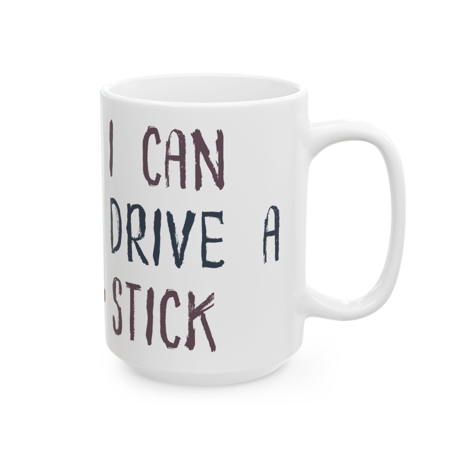 White mug with text 'I CAN DRIVE A STICK' on a white background