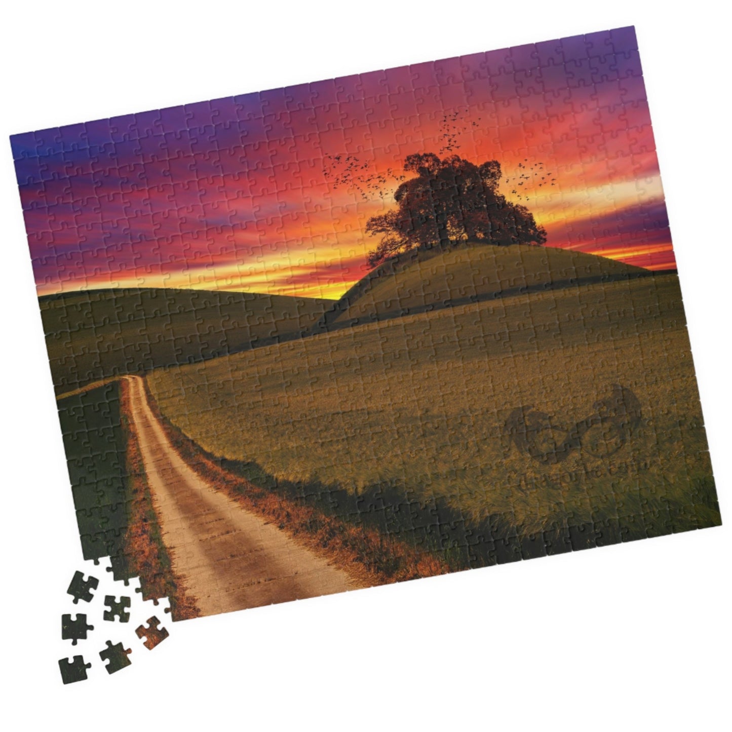 Experience the serene beauty of a country road at sunset with our Country Road Sunset Puzzle. This high-quality puzzle comes with 110 to 1014 pieces, making it perfect for all levels of puzzlers. Each piece fits seamlessly to create a stunning landscape that will provide hours of relaxation and enjoyment.