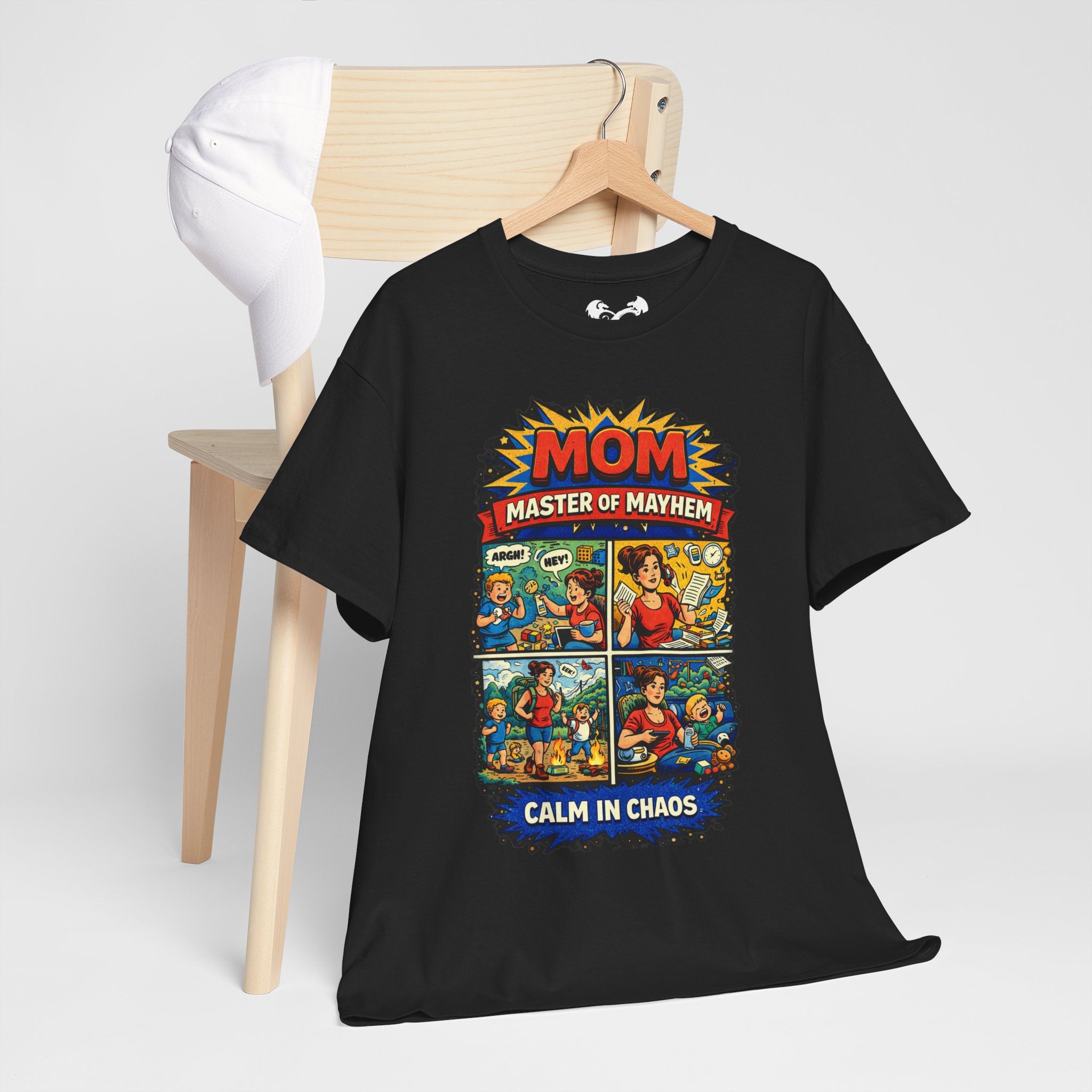 Green t-shirt with a cartoon dragon eating cookies on a hanger against a white background
