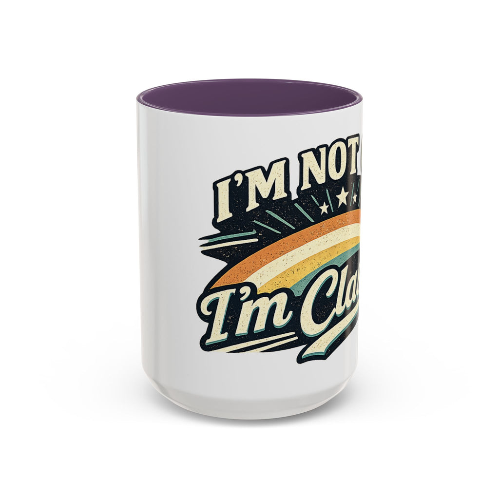 White mug with colorful text design on a white background