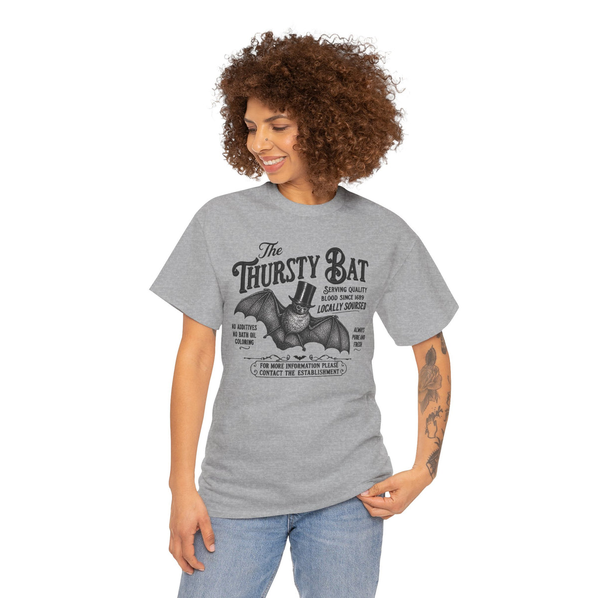 Woman wearing a gray t-shirt with text design on a white background