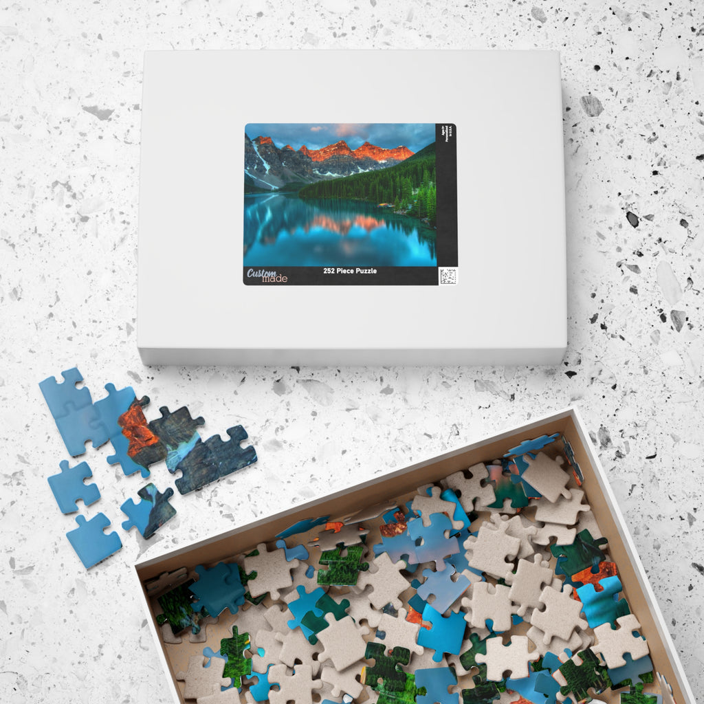 Discover the breathtaking beauty of nature with our Majestic Mountain Reflection Lake Puzzle. Create a stunning masterpiece with 110 to 1014 pieces, capturing the majestic mountains and peaceful reflection of the lake. A perfect blend of art and entertainment, this puzzle is sure to provide hours of relaxation and satisfaction.