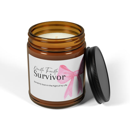 Candle in a brown jar with a label reading 'Survivor' on a white background