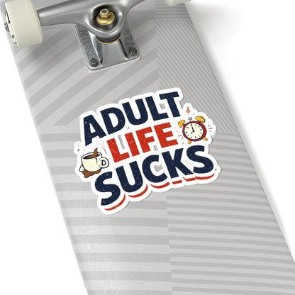 Skateboard with a 'Adult Life Sucks' sticker on a white background