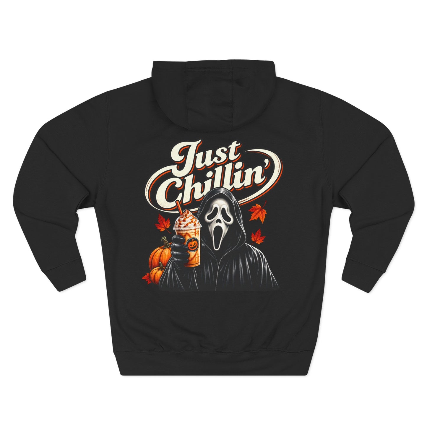 A black pullover hoodie shown from the back, featuring a graphic print of the Ghostface character in a hood holding a pumpkin drink, with the text 'Just Chillin'' in cream and orange above.