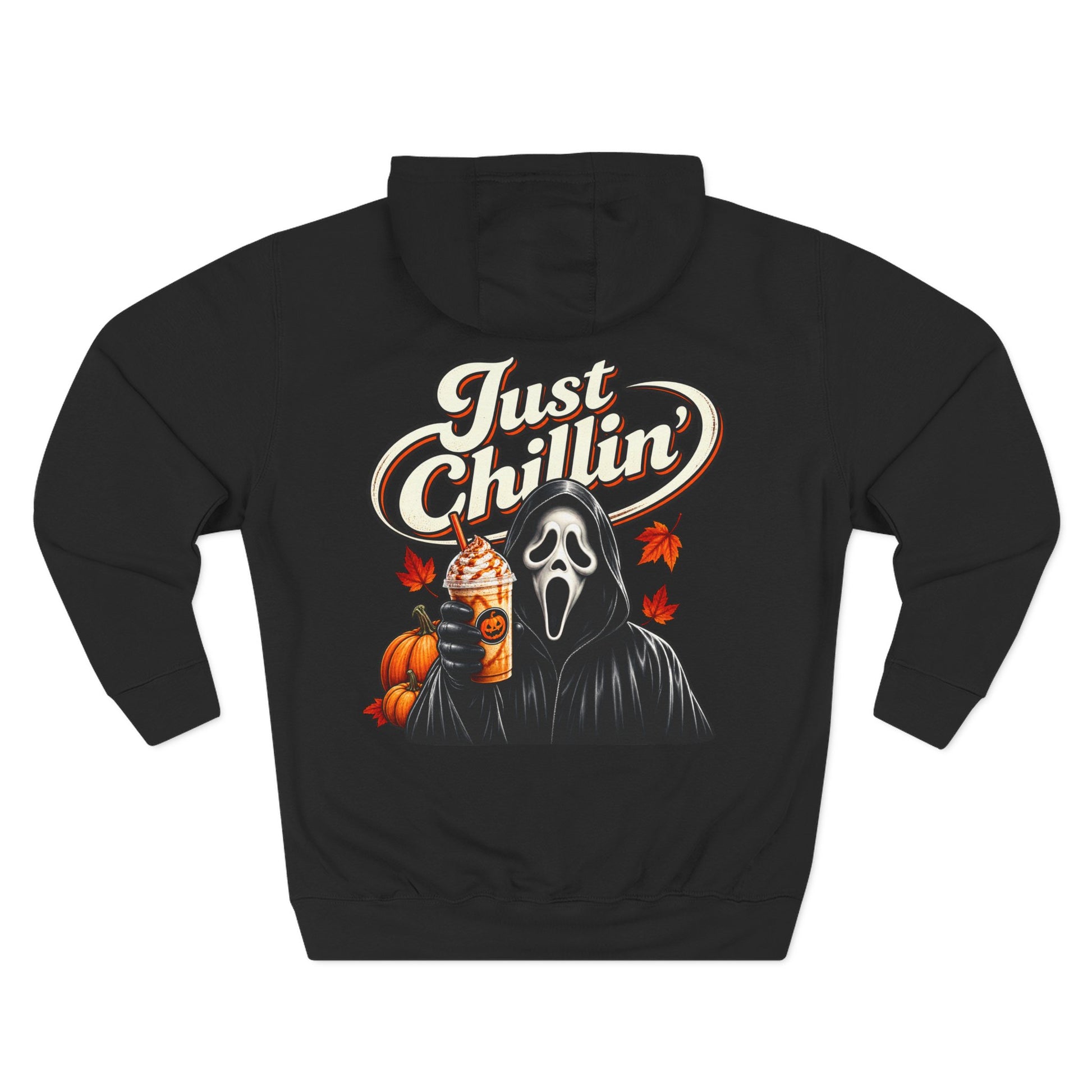 A black pullover hoodie shown from the back, featuring a graphic print of the Ghostface character in a hood holding a pumpkin drink, with the text 'Just Chillin'' in cream and orange above.