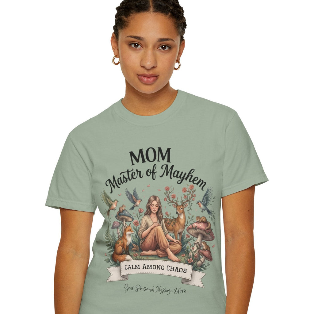 Woman wearing a light green t-shirt with a graphic design and text.