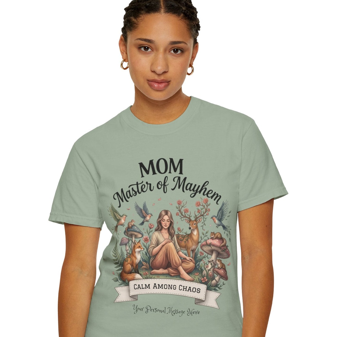 Woman wearing a light green t-shirt with a graphic design and text.