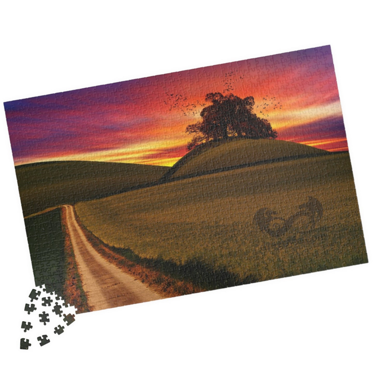 Experience the serene beauty of a country road at sunset with our Country Road Sunset Puzzle. This high-quality puzzle comes with 110 to 1014 pieces, making it perfect for all levels of puzzlers. Each piece fits seamlessly to create a stunning landscape that will provide hours of relaxation and enjoyment.