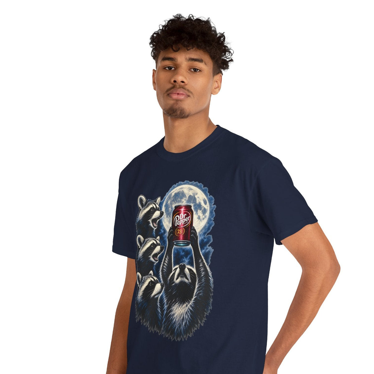 A man wearing a navy blue t-shirt with a detailed graphic Raccoons Worshiping a can of Dr. Pepper Soda With Full Moon Comfortable Cotton T-Shirt