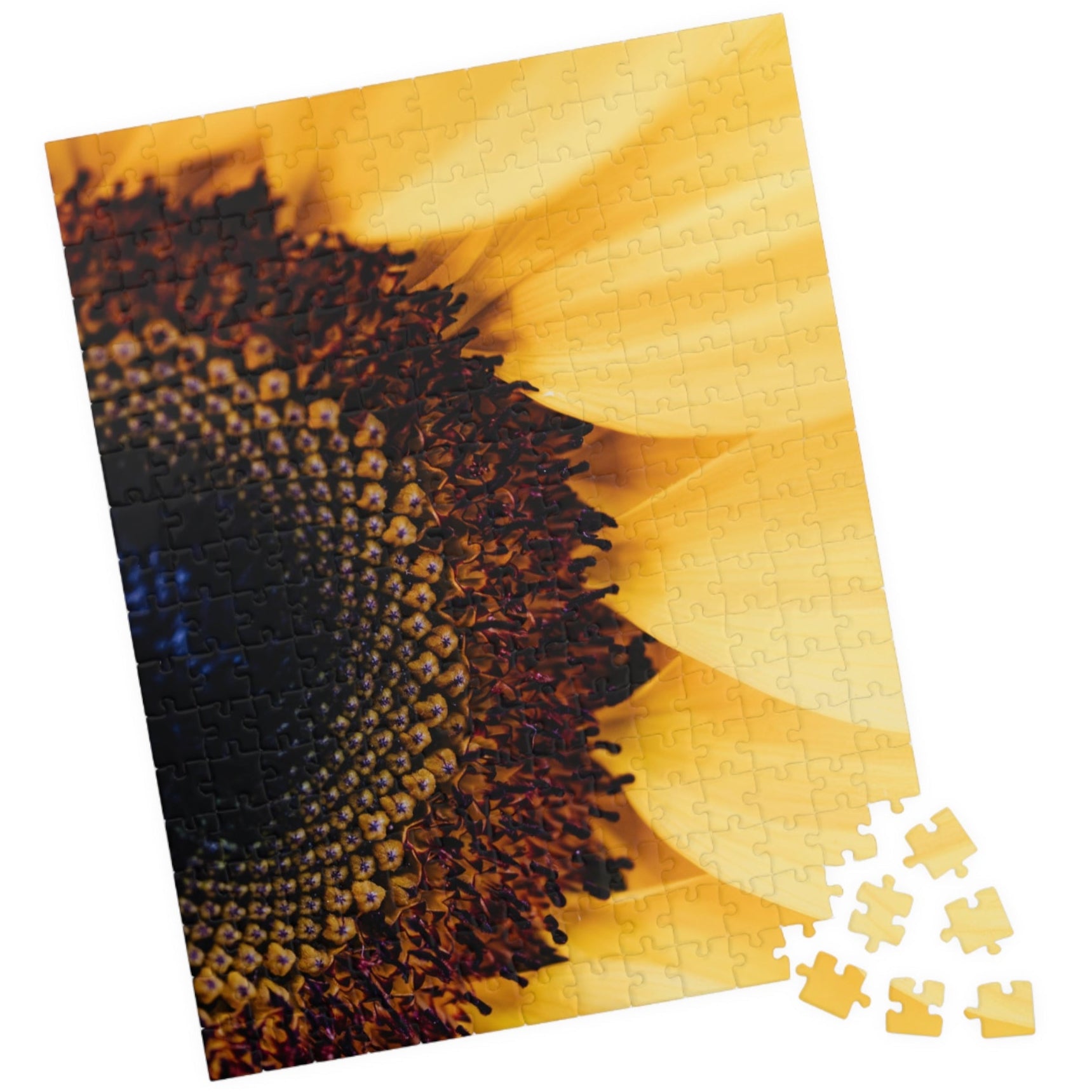 Unleash your inner puzzle solver with our Sunflower Close Up Puzzle! Piece together the vibrant colors and intricate details of this 110 to 1014 piece puzzle. Perfect for anyone who loves a challenge, this puzzle will provide hours of entertainment and a sense of accomplishment upon completion. Get yours today and experience the joy of solving!